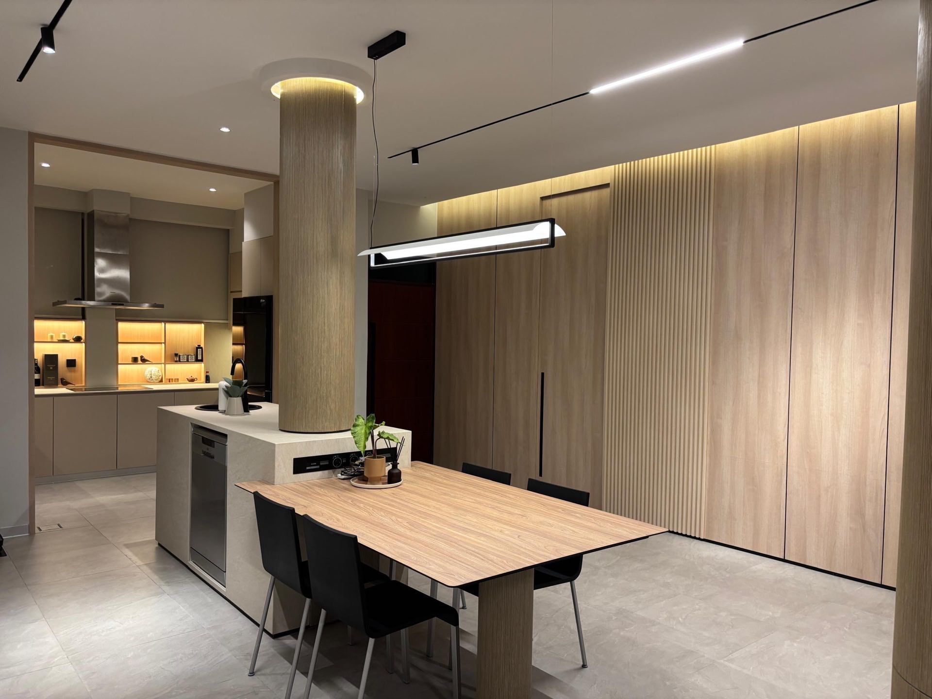 Dining area with custom table and tile feature
